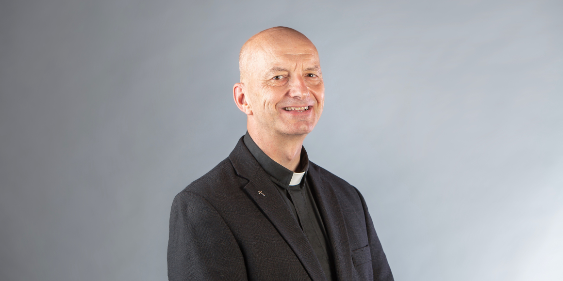 Headshot of Rev. Canon Chris VanBuskirk