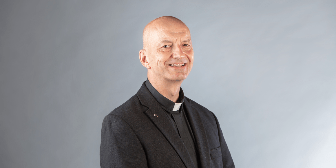 Headshot of Rev. Canon Chris VanBuskirk