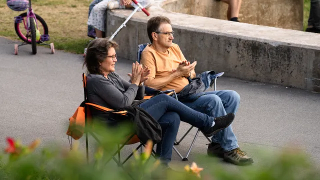 Residents listening to live music at Victoria Park