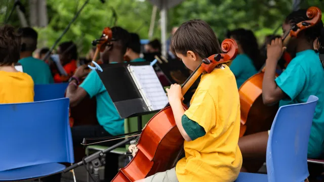 Child playing cello