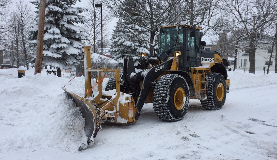 Plow clearing the streets during the winter