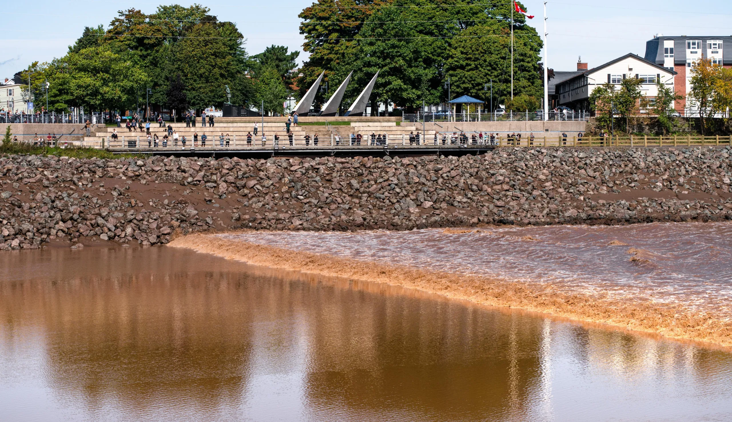a view of Bore Park from across the Petitcodiac River